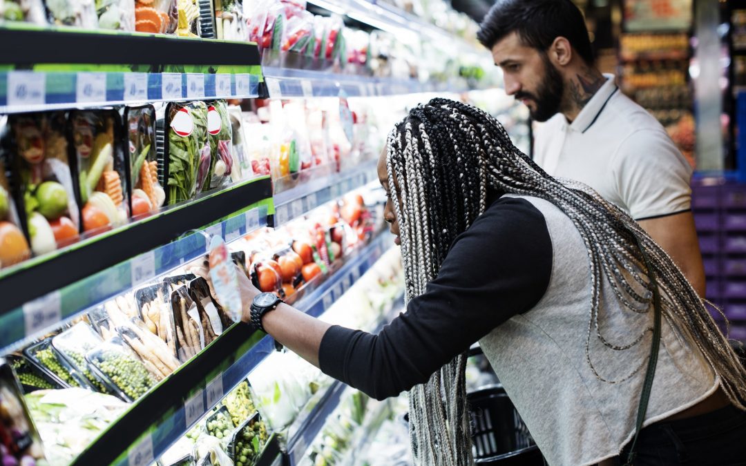 A couple shopping for food